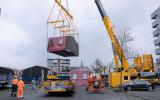 NH Bouwstroom aanvoer woningen van Parteon in Rosmolenbuurt Zaandam